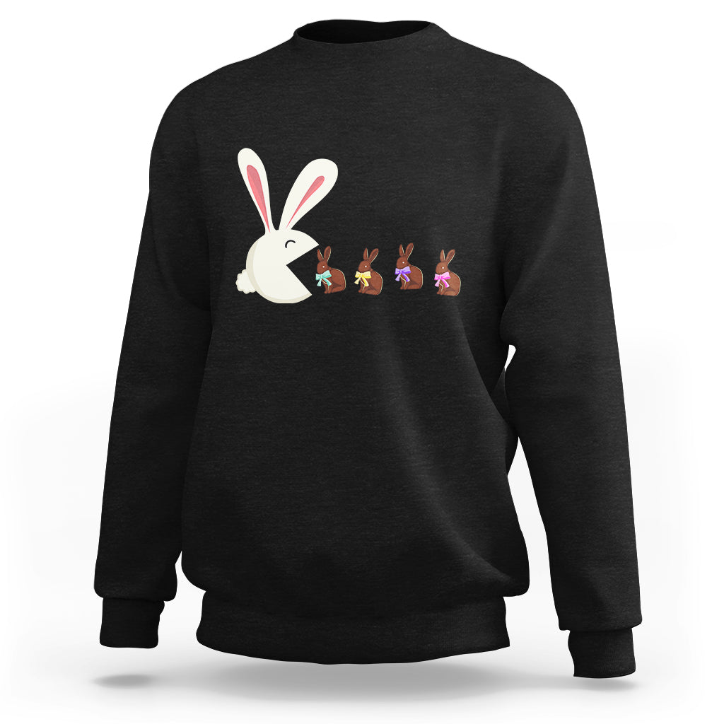 Black Easter sweatshirt with cute bunny eating chocolate graphic on front.