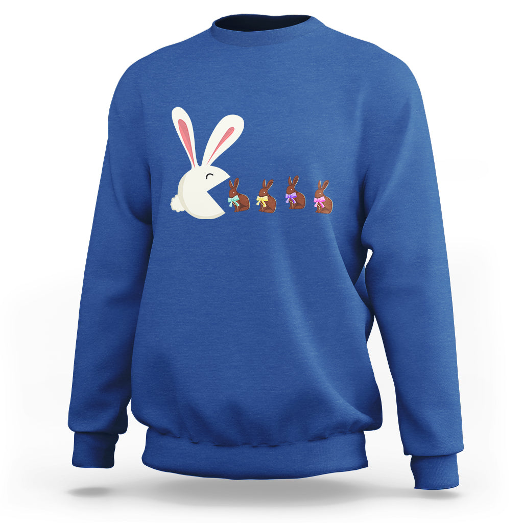 Royal blue Easter sweatshirt with cute bunny eating chocolate graphic on front.