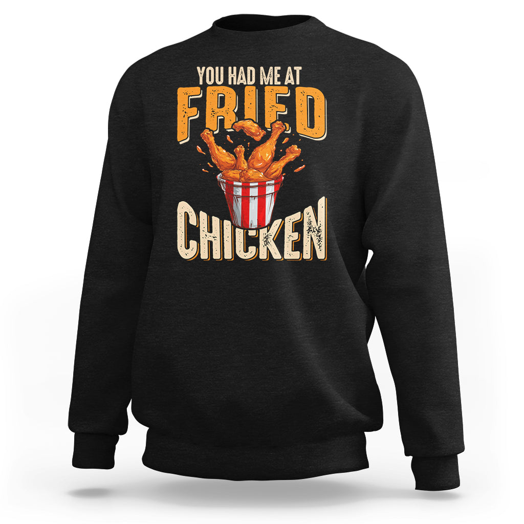 Black sweatshirt with fried chicken bowl graphic and “FRIED CHICKEN” text on front