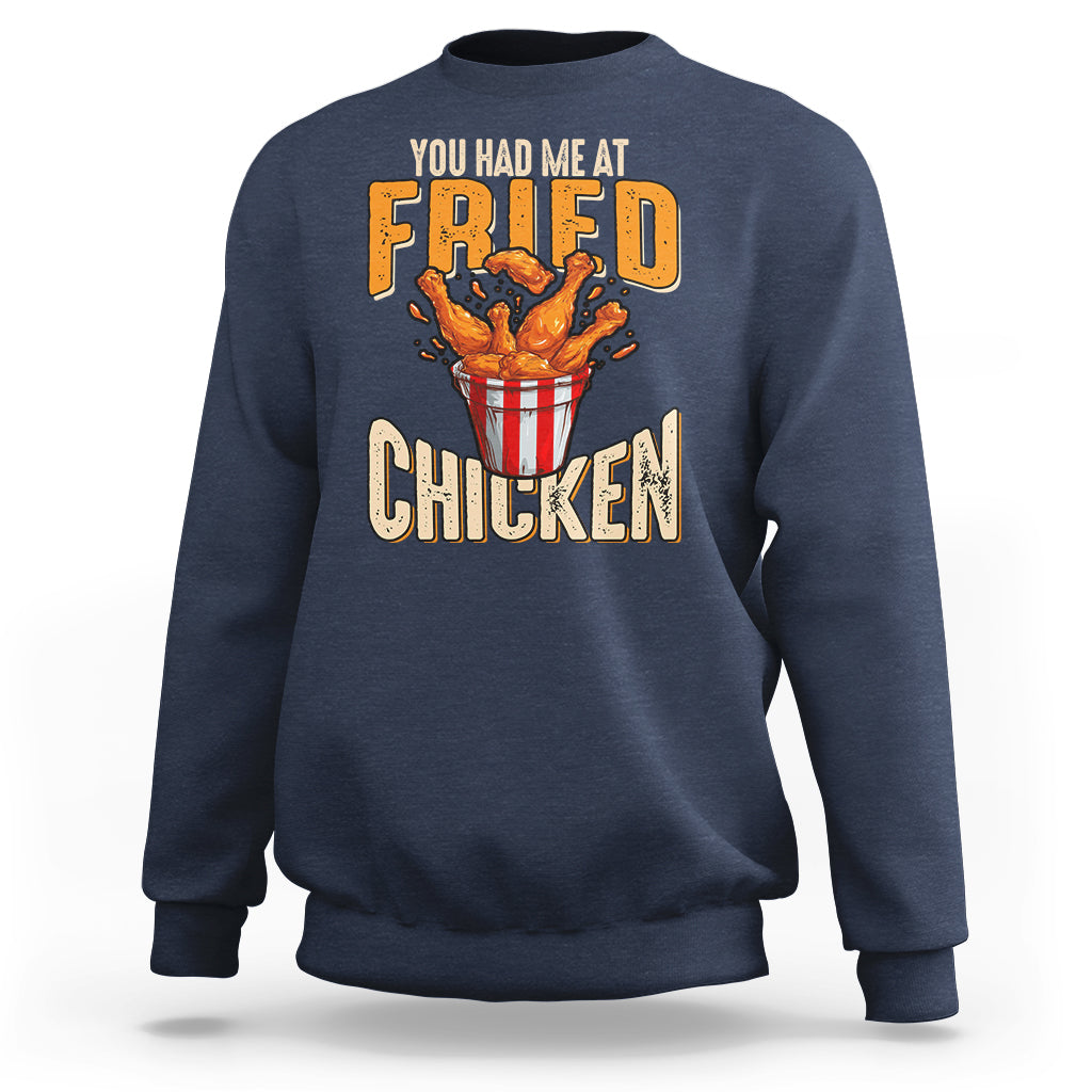 Navy sweatshirt with fried chicken bowl graphic and “FRIED CHICKEN” text on front