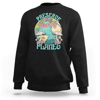 Black crewneck sweatshirt with front graphic "Preserve this naughty planet".
