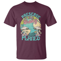 Earth Day T-shirt in maroon with colorful groovy planet preserve graphic.