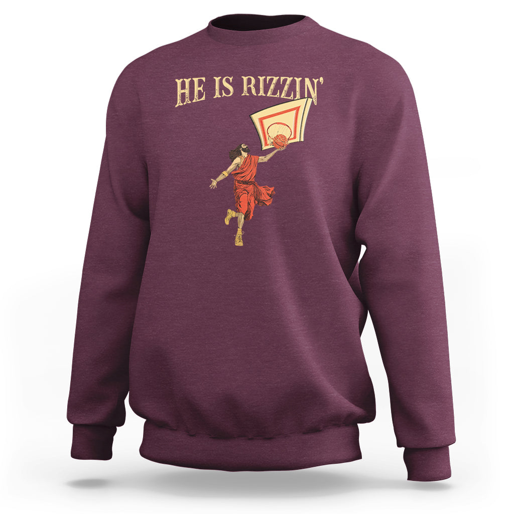 Maroon crewneck sweatshirt with HE IS RIZMIN' text and basketball player graphic