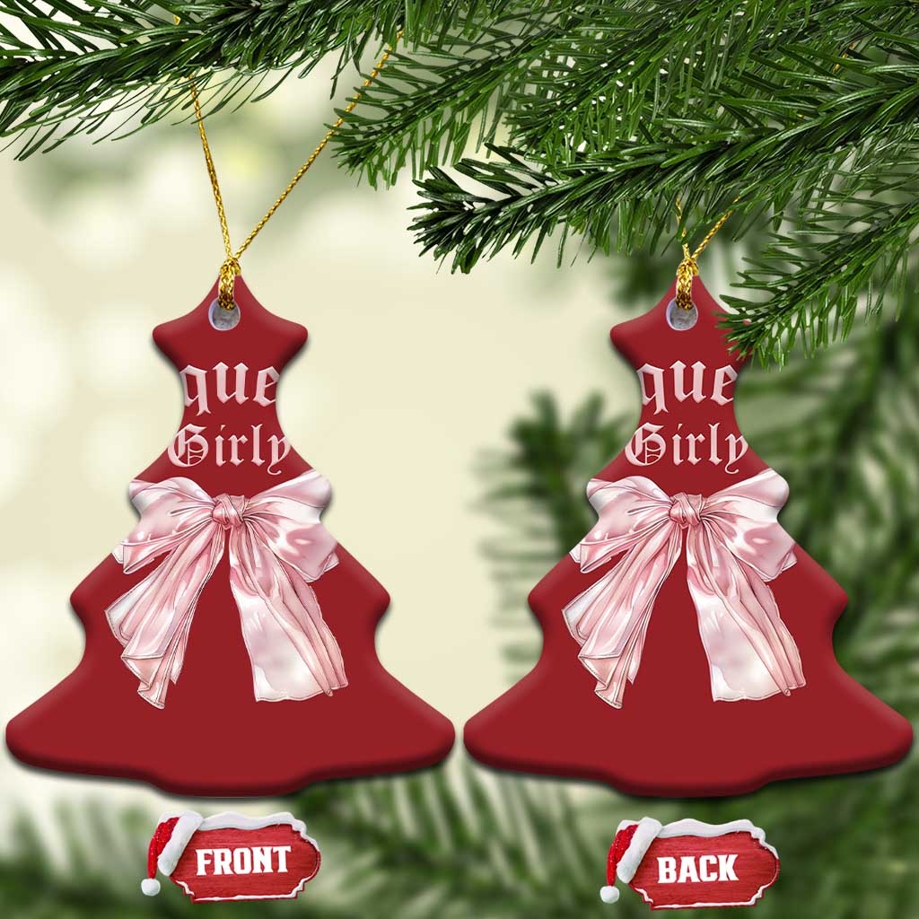 Pair of red bell Christmas ornaments with pink bows and gold hanging strings