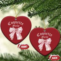 Set of red heart Christmas ornaments with pink bows and gold hanging strings