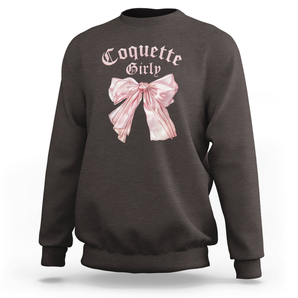 Dark chocolate crewneck sweatshirt with pink bow graphic on chest, ribbed cuffs and hem.