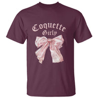 Maroon graphic T-shirt with pink bow ribbon and Coquette Girly logo