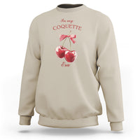 Sand sweatshirt with cherry and bow graphic at chest, crew neck
