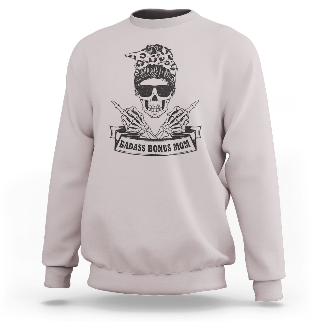 Bonus mom sweatshirt, pale gray crewneck with skull graphic and “Badass Bonus Mom” print