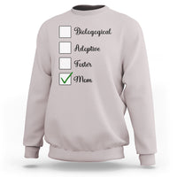 Light gray crewneck sweatshirt with adoption-themed list graphic and check mark