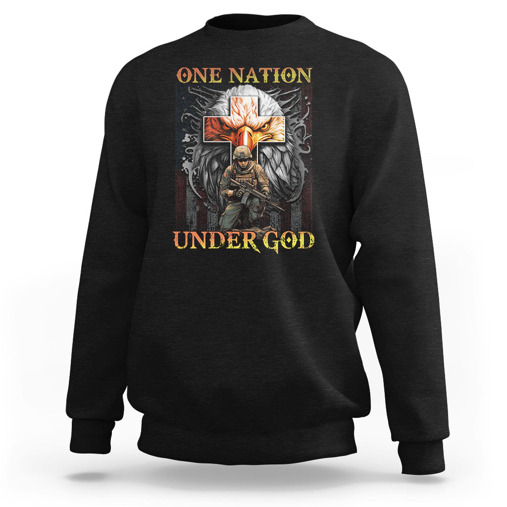 Black crewneck sweatshirt with 'ONE NATION UNDER GOD' cross and wing graphic