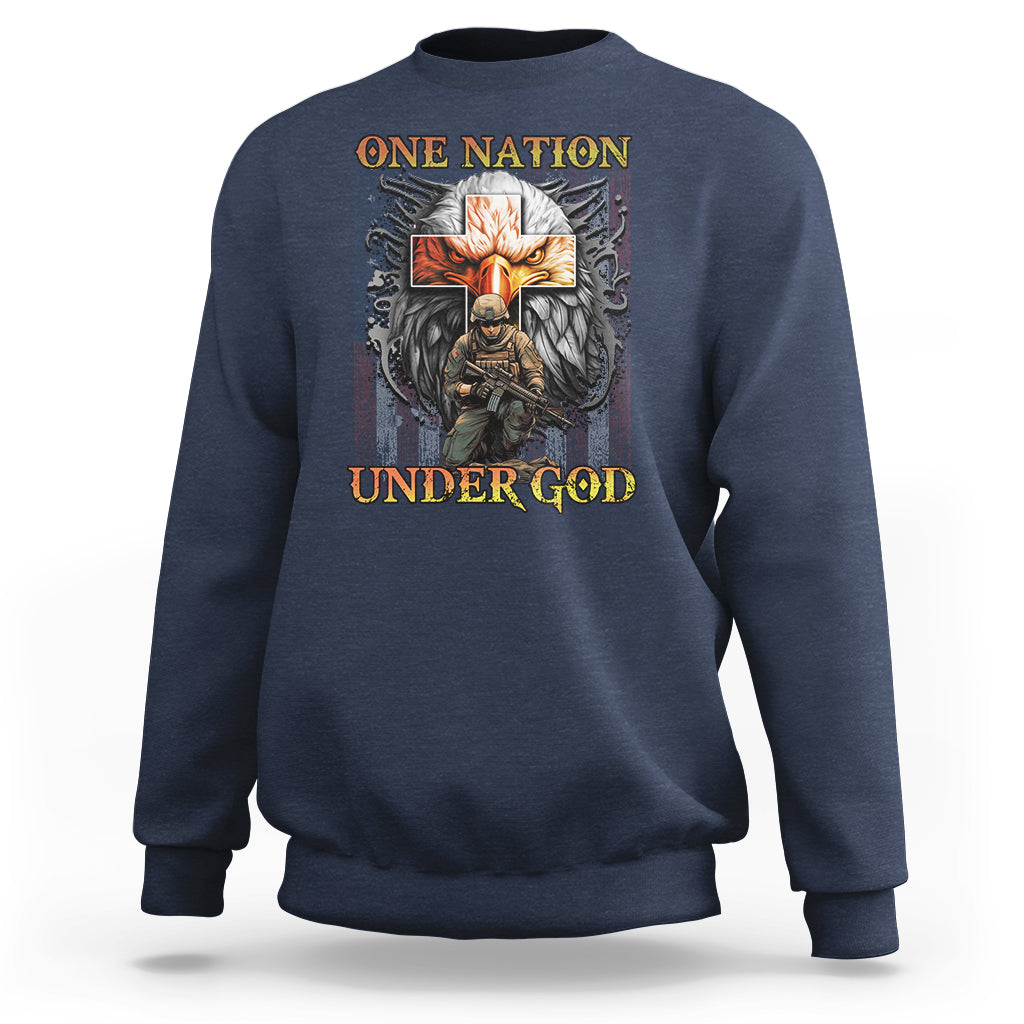 Navy crewneck sweatshirt with 'ONE NATION UNDER GOD' cross and wing graphic