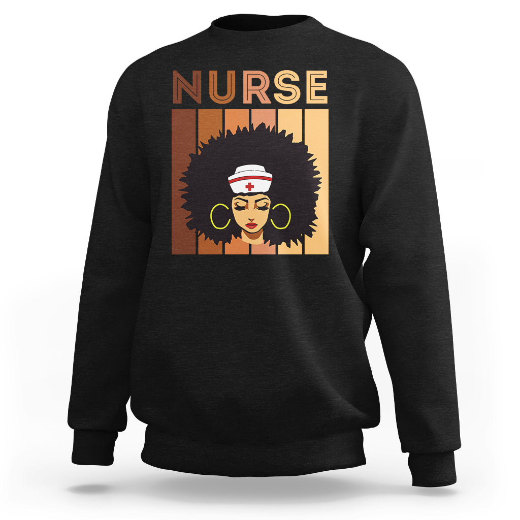 Black crewneck sweatshirt with nurse graphic and “NURSE” text on the chest.