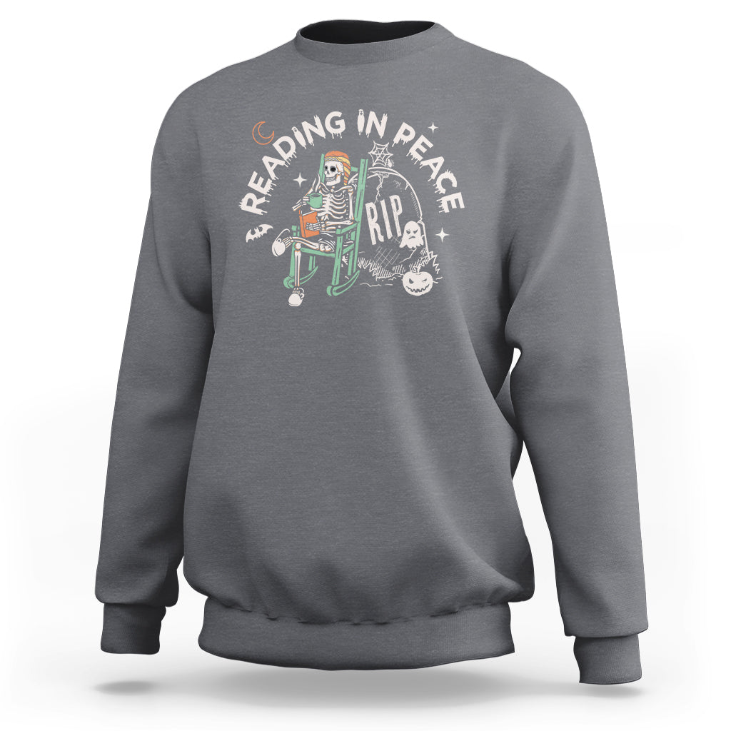 Charcoal gray crewneck sweatshirt with reading RIP skeleton graphic on chest
