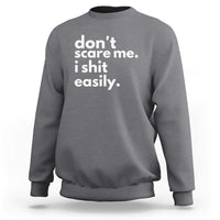 Charcoal crewneck sweatshirt with 'don't scare me. i shit easily.' print