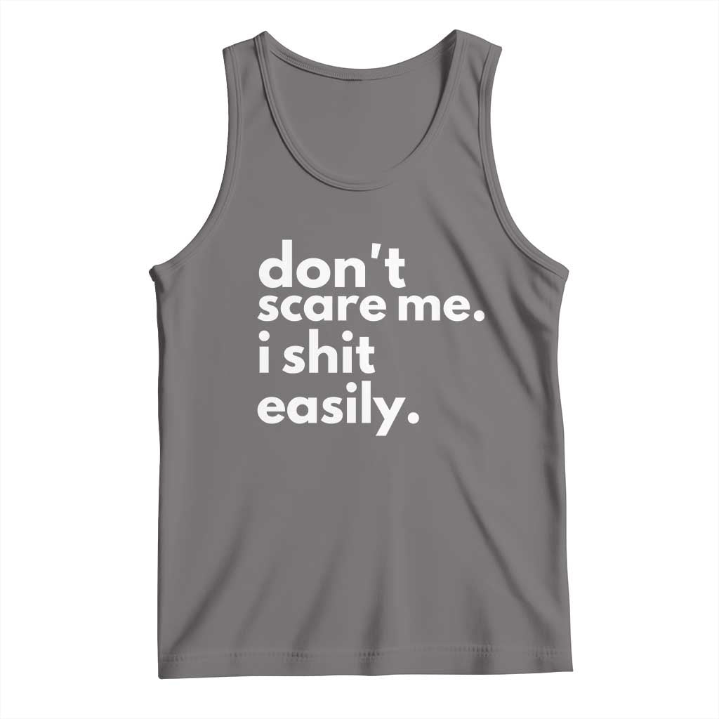 Gray tank top with white quote: don't scare me. i shit easily.