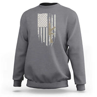 Charcoal gray crewneck sweatshirt with American flag graphic and rifle-themed print on chest