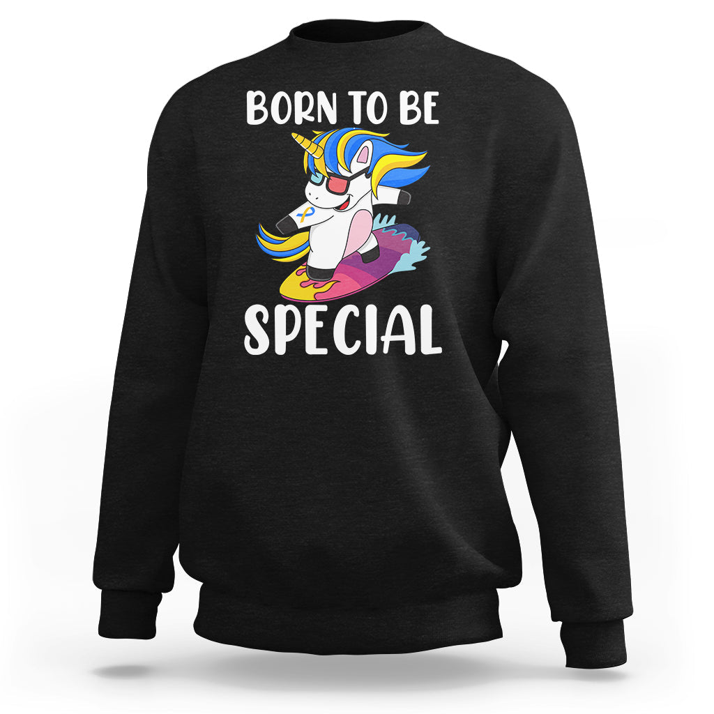 Black sweatshirt with unicorn graphic and text “BORN TO BE SPECIAL” on the chest.