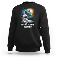 Black crewneck sweatshirt with astronaut eclipse front graphic