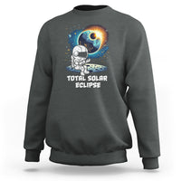 Dark heather gray crewneck sweatshirt with astronaut eclipse front graphic