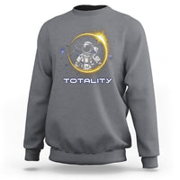 Light dark gray heather sweatshirt with astronaut graphic and “TOTALITY” text on the front