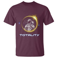Astronaut Totality graphic T-shirt in maroon with solar eclipse circle and text