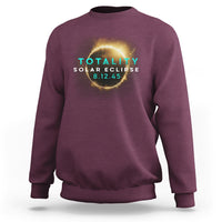 Maroon crewneck sweatshirt with "TOTALITY SOLAR ECLIPSE 8.12.45" eclipse logo on front