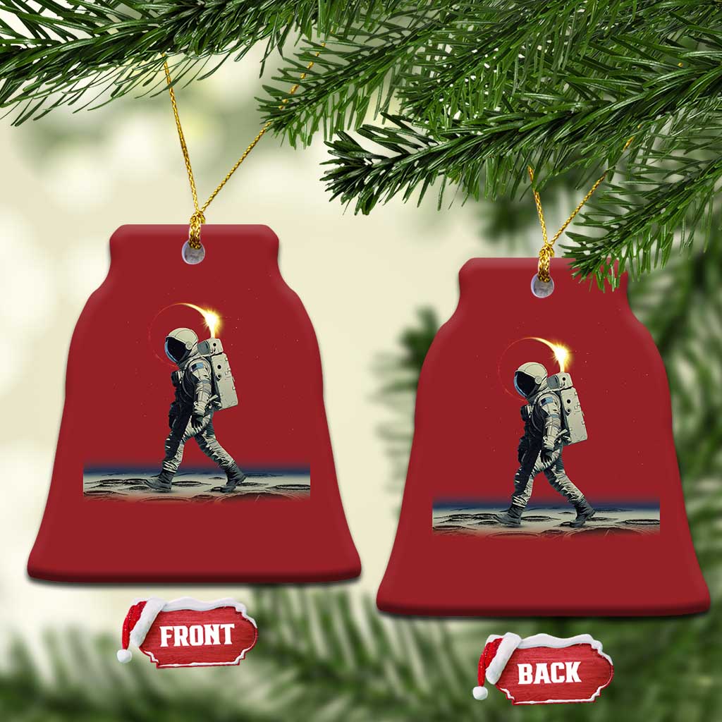 Set of red bell-shaped astronaut ornaments with gold hangers; front and back tags shown
