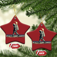Set of red star-shaped astronaut ornaments with gold hangers; front and back tags shown