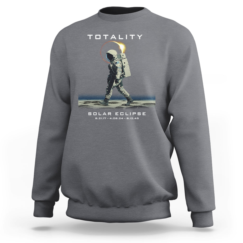 Gray crewneck sweatshirt with astronaut eclipse graphic and “TOTALITY” text on back