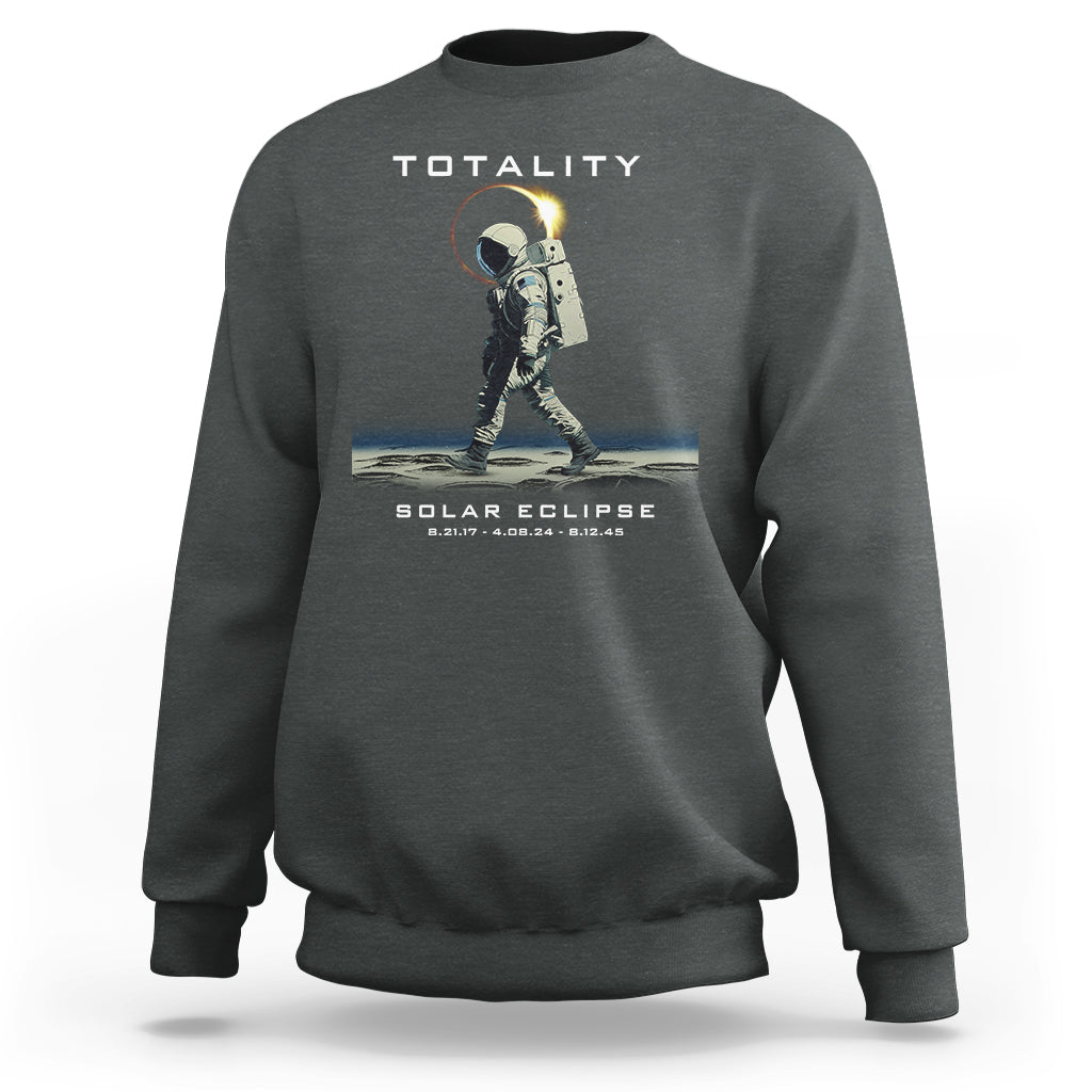 Dark gray crewneck sweatshirt with astronaut eclipse graphic and “TOTALITY” text on back