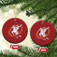 Pair of red round Christmas ornaments with astronaut riding unicorn galaxy design