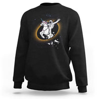 Astronaut sweatshirt in black with unicorn riding eclipse graphic on front