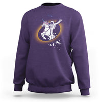 Astronaut sweatshirt in purple with unicorn riding eclipse graphic on front