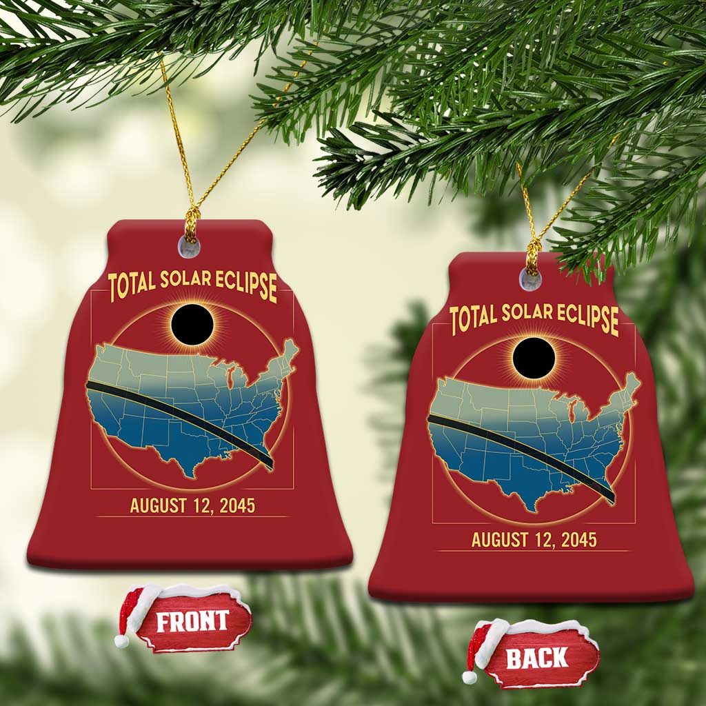 Red bell-shaped solar eclipse map Christmas ornament with gold text and hanging loop