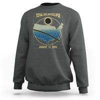 Charcoal crewneck sweatshirt with eclipse map graphic and 'AUGUST 12, 2045' text