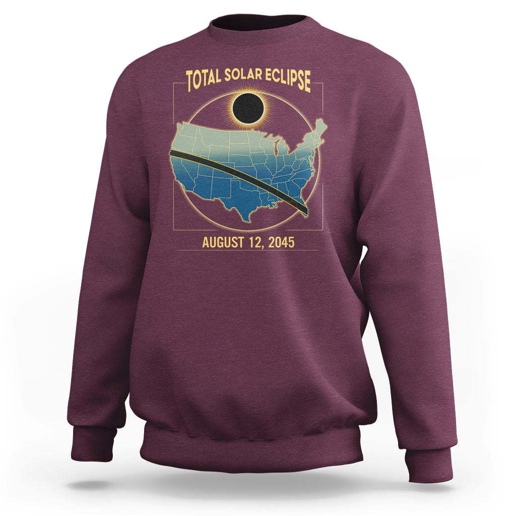 Maroon crewneck sweatshirt with eclipse map graphic and 'TOTAL SOLAR ECLIPSE' text