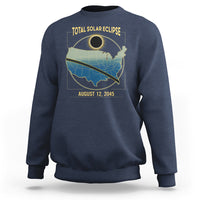 Navy crewneck sweatshirt with eclipse map graphic and 'TOTAL SOLAR ECLIPSE' text