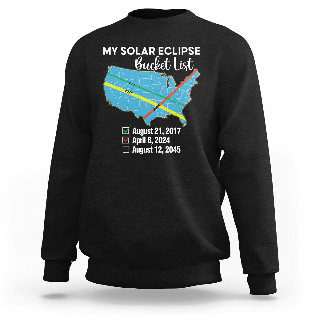 Black crewneck sweatshirt with colorful eclipse map and event dates on back