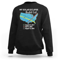 Black crewneck sweatshirt with colorful eclipse map and event dates on back