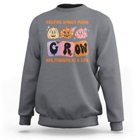 Charcoal gray Halloween reading sweatshirt with “GROW” phoneme graphic and orange text