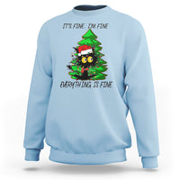 Light blue Christmas sweatshirt with black cat and green tree graphic