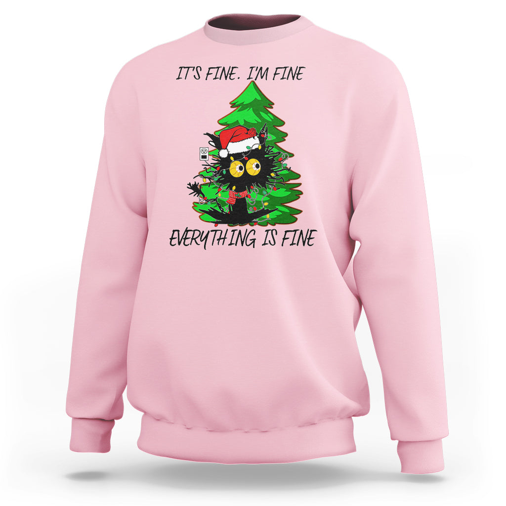 Light pink Christmas sweatshirt with black cat and green tree graphic