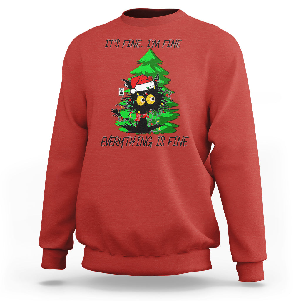 Red Christmas sweatshirt with black cat and green tree graphic