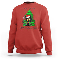 Red Christmas sweatshirt with black cat and green tree graphic