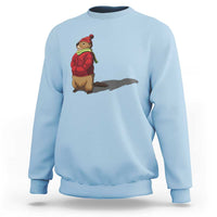 Light blue crewneck sweatshirt with cartoon groundhog shadow graphic on chest.