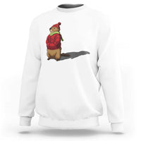 White crewneck sweatshirt with cartoon groundhog shadow graphic on chest.