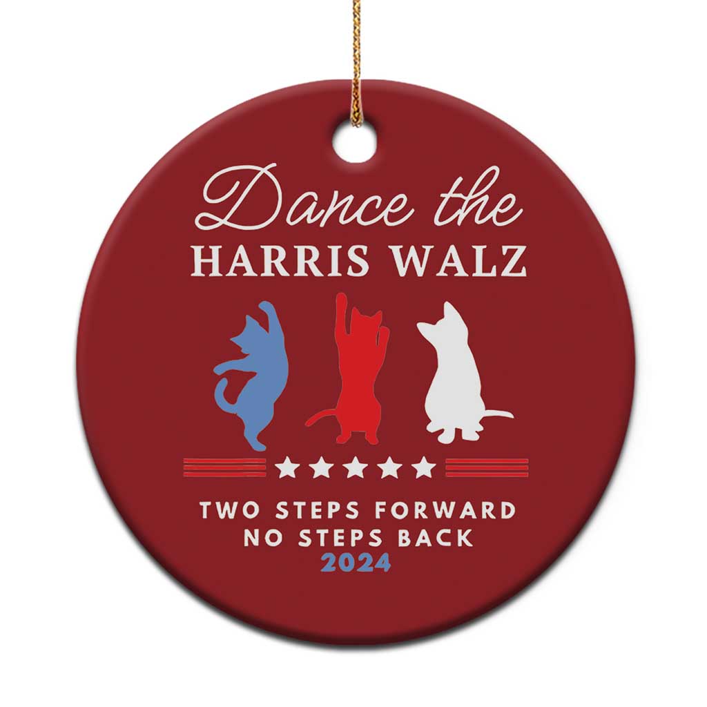 Red round Christmas ornament with gold string, dancer silhouettes, and 2024 text