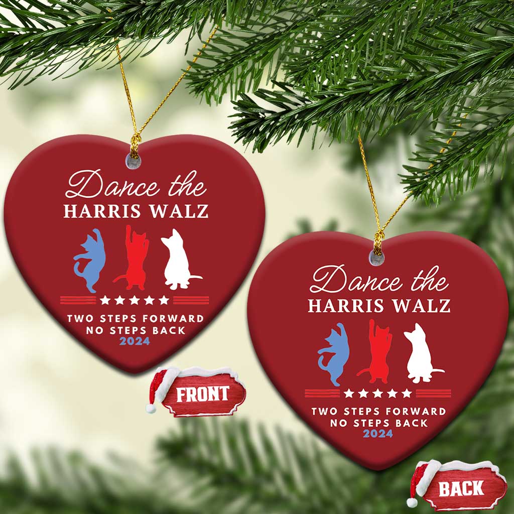 Two red heart-shaped Christmas ornaments hanging on pine, with dancer silhouettes and 2024 text