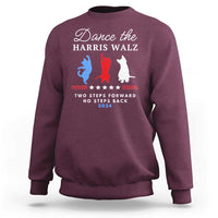 Maroon crewneck sweatshirt with front slogan graphic and red-blue silhouettes